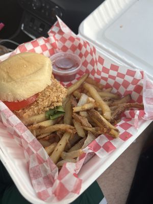 House made buttermilk fried plant-based chik’n patty, smoked onion jalapeno jam, pickles & Alabama white bbq sauce on a house made toasted bun  at The Smokin' Onion in Asheville