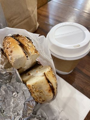 Toasted everything bagel with tofu cream cheese and oat milk latte  at Finns Bagels in New York City