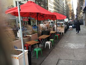 Outdoor seating at Vito's Slices and Ices in New York City