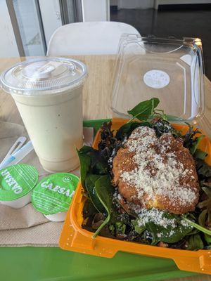 Chicken Caesar salad, holiday nog shake at Plant Power Fast Food - Craig Rd in Las Vegas
