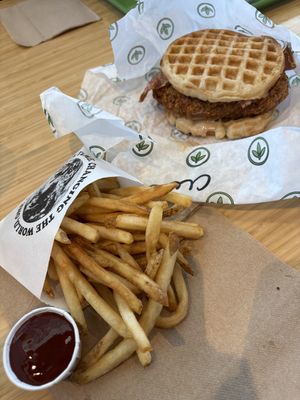 Fries and chicken and waffles sandwich   at Plant Power Fast Food - Craig Rd in Las Vegas