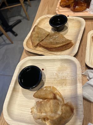 scallion pancakes and fried dumplings (half eaten)  at Black Bamboo in West Hartford