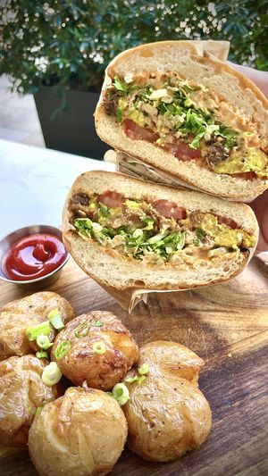 Lions Maine steak N’egg breakfast sandwich   at Cafe Gratitude- Larchmont in Hollywood