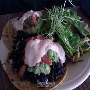 'I am transformed' corn tacos with brown rice black beans and side salad at Cafe Gratitude- Larchmont in Hollywood
