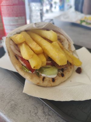 I don't know if you're supposed to eat it with the fries on it but we did and it was so yummy at Gyros House in Kalampaka