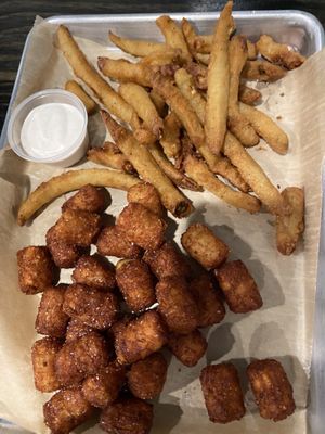Tater tots and pickle fries with vegan ranch  at Maple & Rye in Laporte