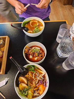 Veg curry ramen (bottom) and vegan cauliflower at Kombu in Antigua