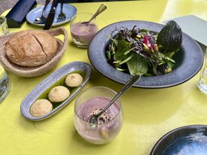 Bread, bean spread, salad, and an amuse bouche of broccoli (hidden under that incredible purple potato puree/sauce!)  at LAUCH in Basel
