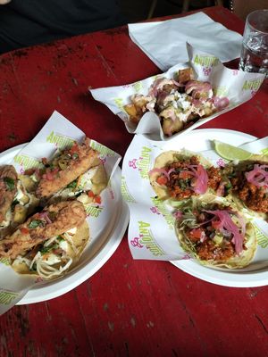 Banana blossom tacos on the left, dirty fries and al pastor tacos on the right at Antojitos - The Dog House in Edinburgh