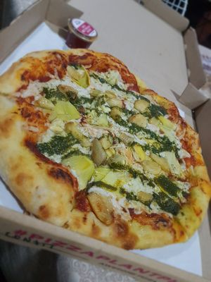 Garlic confit and artichokes with herb puree. Sooo good! at Pizza Plant in San Juan