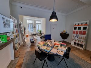 Upstairs area with books at WAY Specialty Coffee Roasters - Voldersstraat in Ghent
