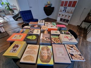 Upstairs area with books at WAY Specialty Coffee Roasters - Voldersstraat in Ghent