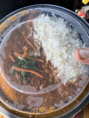 Detox lentils with rice comes with a nan and A crispy bread with pickled onions￼  at It's a Punjabi Affair in Amarillo