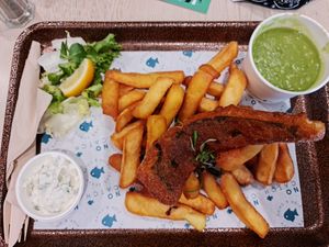 Cod and chips with mushy peas and tartare sauce at The No Catch Co in Brighton