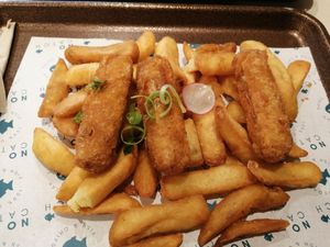 Battered sausage and chips at The No Catch Co in Brighton
