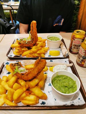 Classic cod fish & chips with mushy peas and tartare sauce. at The No Catch Co in Brighton