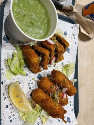 Tofish pieces, battered sausage and mushy peas   at The No Catch Co in Brighton