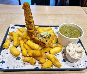 Cod n chips, mushy peas and tartare sauce. at The No Catch Co in Brighton