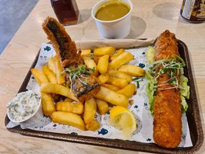 Battered cod, chips, tartare sauce and jumbo battered saveloy at The No Catch Co in Brighton