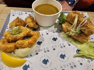 Tempura prawns, curry sauce and battered sausages at The No Catch Co in Brighton