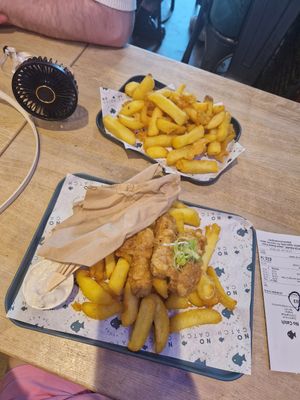 Battered sausages and chips with garlic aioli dip at The No Catch Co in Brighton