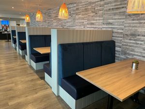 Booth seating, WiFi and charging plugs at The Bowgie Inn in Newquay