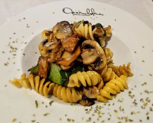 Fusilli with fresh mushrooms, cabbage, and heura chunks (soy protein). at Assembleia in Arouca
