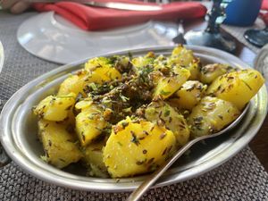 Aloo Jeera - potatoes cooked with cumin seeds and spices. Delicious!! at Hola India in Jaco
