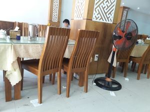 Floor littered with trash from previous guests at Thuy in Da Nang