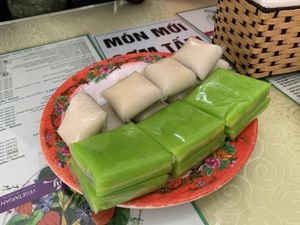 Don't let the neon green color fool you... Those rice and green been cakes are totally awesome. at Thuy in Da Nang