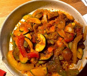 bulgur topped with veggies with turkish tomato sauce.   at Bona'me in Cologne