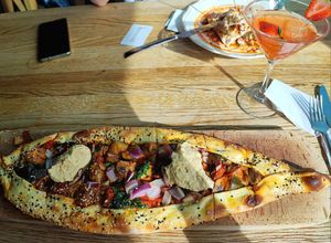 Vegan Pide with grilled vegetables and hummus at Bona'me in Cologne
