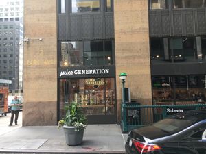 View from outside--notice that it is right by subway entrance. at Juice Generation in New York City
