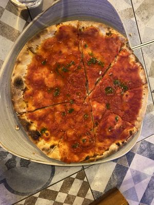 Gluten-free pizza with tomato, garlic, herbs and olive oil   at Gino's in Venice