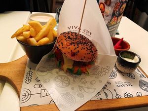 Seitan burger with fries at Tel Aviv Urban Food in Warsaw