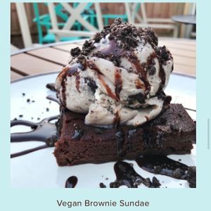 Vegan brownie topped with Oat-milk based vanilla ice cream at Splits and Giggles Cafe in Lancaster