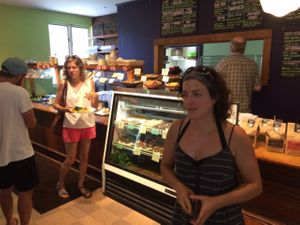 super friendly owner putting our order in to the kitchen.  at Sweet Pea Natural Foods Cafe in Waitsfield