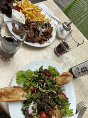 Lentil salad and vegan soy gyros with fries.  at Dada in Regensburg
