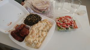 some good old bbq seitan twist, greens, potato salad that's to die for, and salad on the side. also a sandwich with fried seitan. at The Miznon in Dimona