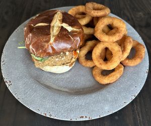 Atlas Monroe sandwich with onion rings   at Naked Vegan in Greenville