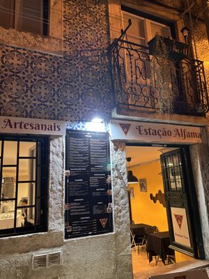 Patio light is BRIGHT but the music and service were great, lots of fun   at Estação Alfama Pizzaria in Lisbon