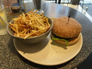 Autumn 2023: fries with cumin seasoning (too thin for my taste) and Signature burger (with less filling than before, but still very tasty)  at Copper Branch in Utrecht