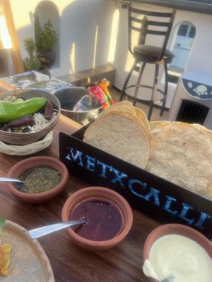 Crispy tacos and chilli sauces  at Metxcalli in Oaxaca