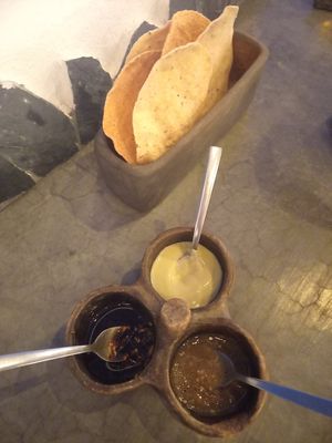 The green souce is vegan. The other one is Avocado-Mayonnaise & the red one is "chicatanas" souce made of ants at Metxcalli in Oaxaca