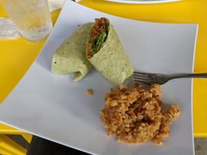 Jerk chick'n wrap with seasoned potatoes at Sweet Vegan Bakes in Chicago