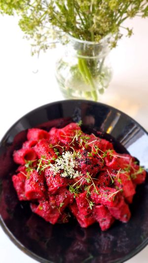 Beetroot pasta with chervil flowers and roasted nigella seeds. at Sono Matseljur in Reykjavik