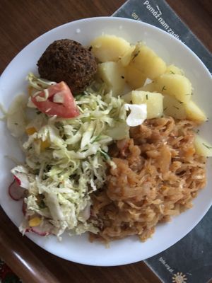 Warm cabbage, potatoes, two different salad s and kofta  at Vega in Warsaw