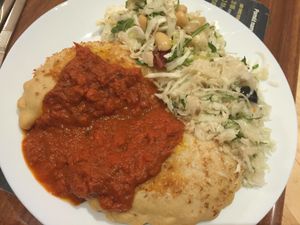 salad sauce and lentils cake at Vega in Warsaw