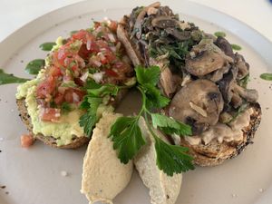 Mixed mushrooms & kale with hummus and avocado on sour dough toast  at Aussie Coffee Ipanema in Rio De Janeiro