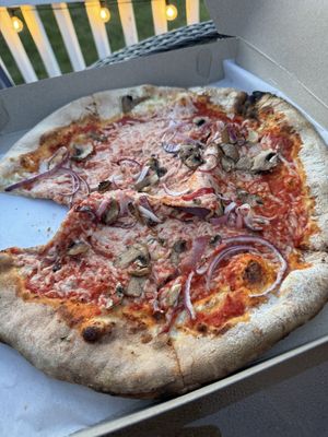 Vegan pizza with red onion and mushroom  at Geddy's in Bar Harbor